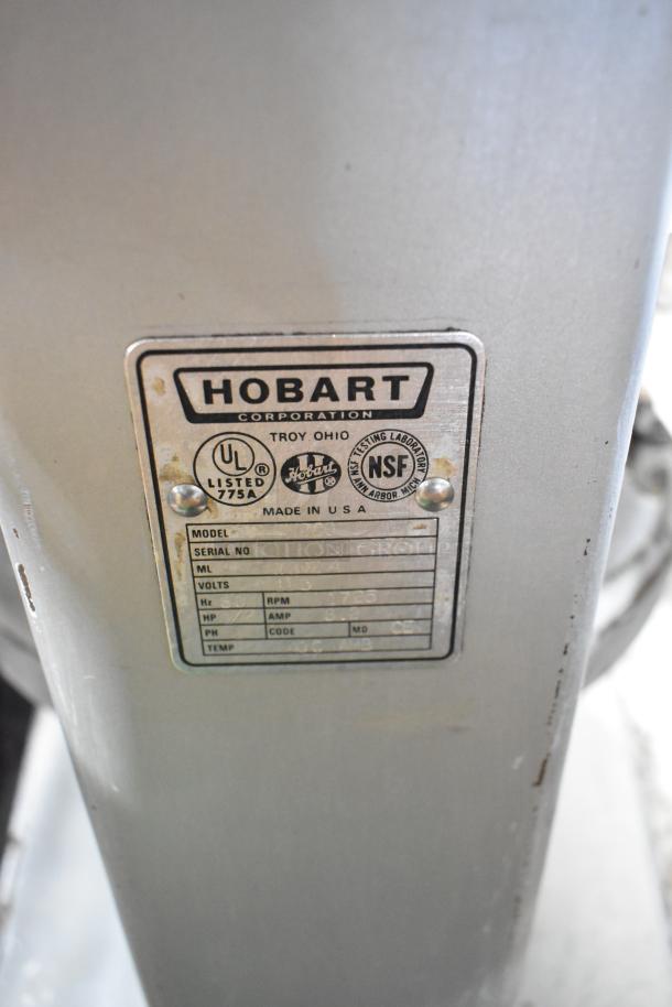 Hobart A 200 commercial 20-quart dough mixer, metal finish, with label showing 115 volts, 1 phase, made in USA.