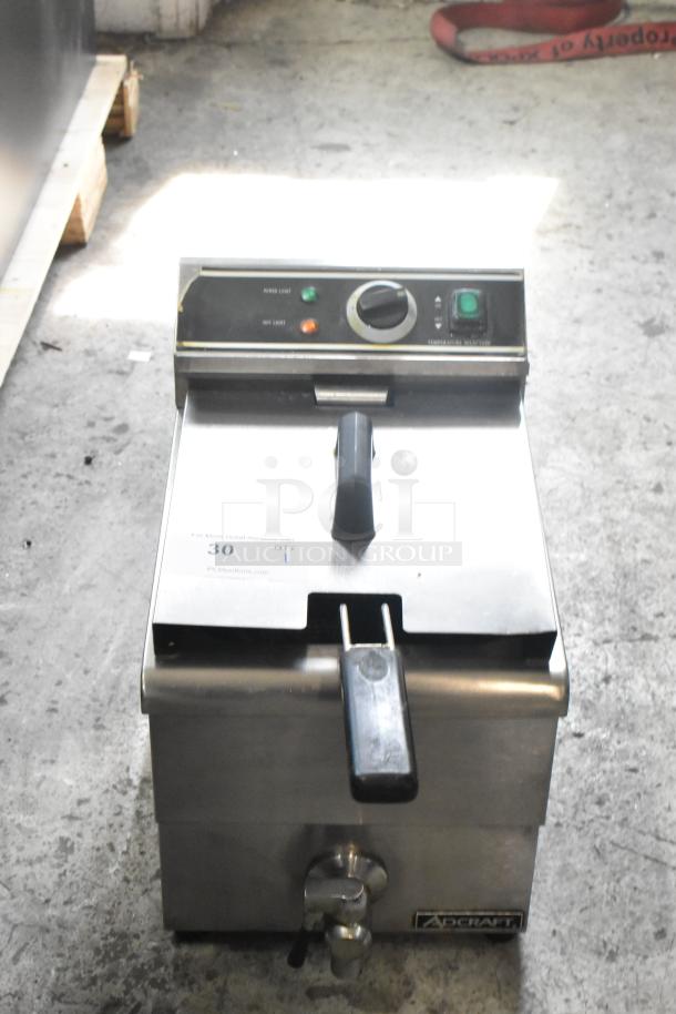 Adcraft DF-12L stainless steel countertop deep fryer with metal fry basket, lid, and temperature controls, in good condition.