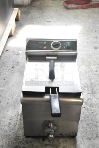 Adcraft DF-12L stainless steel countertop deep fryer with metal fry basket, lid, and temperature controls, in good condition.