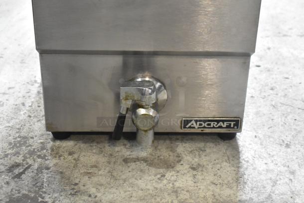 Adcraft DF-12L stainless steel countertop deep fryer, single bay, with drain spout, logo visible, used condition.