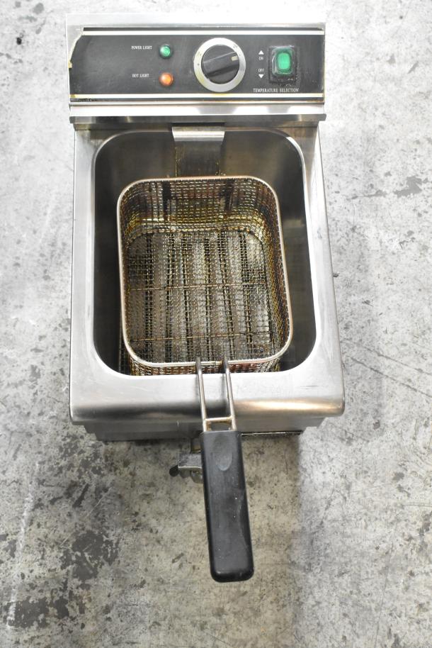 Adcraft DF-12L stainless steel electric countertop fryer with metal fry basket and lid. Shows temperature controls and lights.