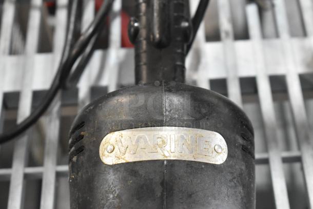 Waring WSB Immersion Blender Base, black, 120 volts, 1 phase, visible wear, Waring logo on metal tag.