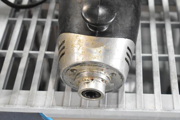 Waring WSB Immersion Blender Base, 120V, 1 Phase. Black, silver finish, replaceable coupling design, used condition.
