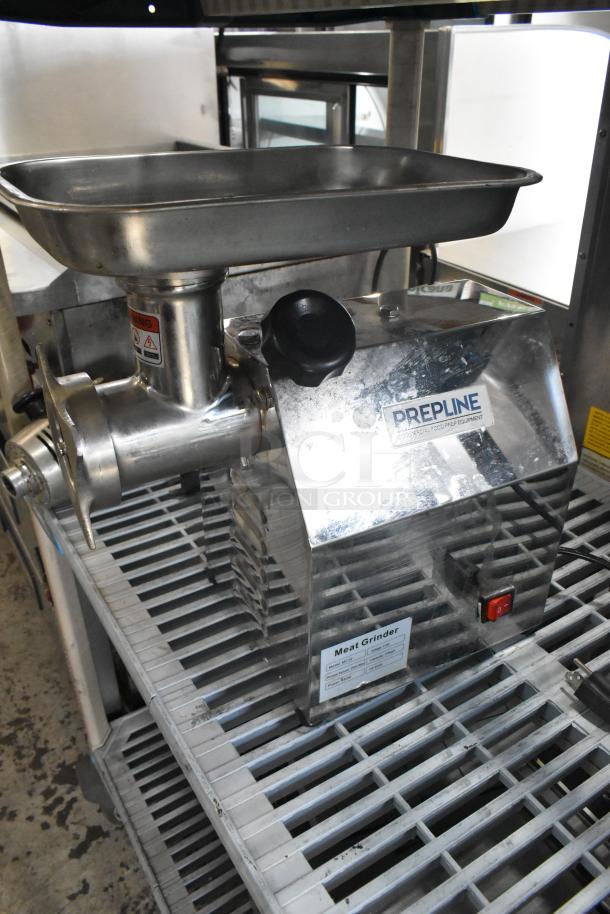 PrepLine MC12 metal commercial meat grinder, 110V, 1 phase, stainless steel, countertop model in good condition.