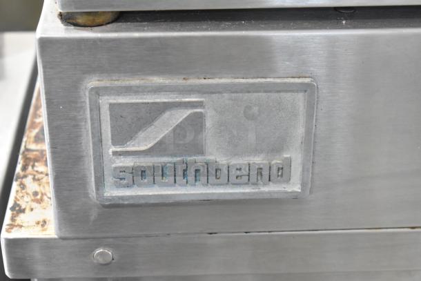 Southbend SilverStar stainless steel label on commercial convection oven, featuring thermostatic controls and metal racks.