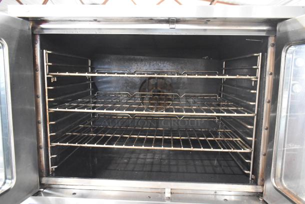 Southbend SilverStar stainless steel convection oven with view-through doors, metal racks, thermostatic controls, on casters.