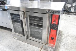 Vulcan VC6GD-SEFCA stainless steel commercial gas convection oven with view-through doors, metal racks, and thermostatic control.