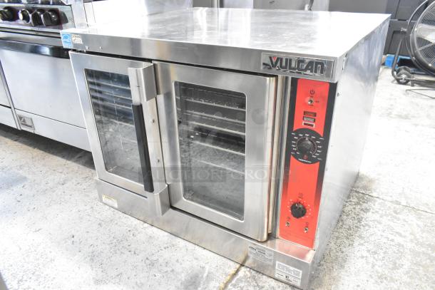 Vulcan VC6GD-SEFCA stainless steel convection oven with view-through doors, metal racks, thermostatic control, excellent condition.