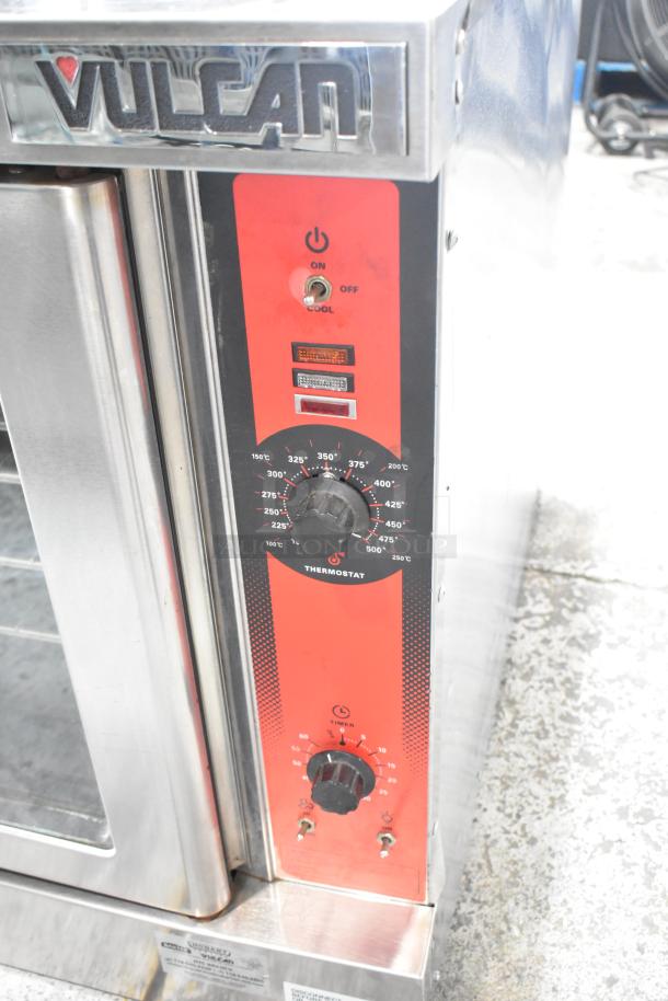 Vulcan VC6GD-SEFCA stainless steel convection oven, view-through doors, metal racks, thermostatic control, shown in good condition.
