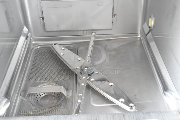2016 Hobart LXER commercial undercounter dishwasher interior, stainless steel, clean condition, spray arms visible.