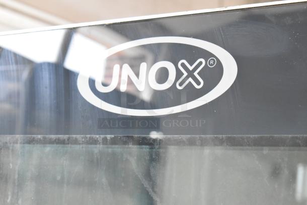 2018 Cadco Unox XAVC-10FS-GPR stainless steel combi oven, 49,260 BTU, commercial half size, visible Unox logo.