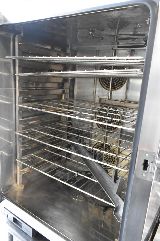 2018 Cadco Unox XAVC-10FS-GPR half-size combi oven, stainless steel, 49,260 BTU, multiple racks, excellent condition.