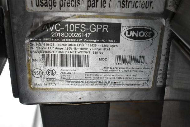 2018 Cadco Unox XAVC-10FS-GPR stainless steel commercial combi oven label. 49,260 BTU, made in Italy, model details.