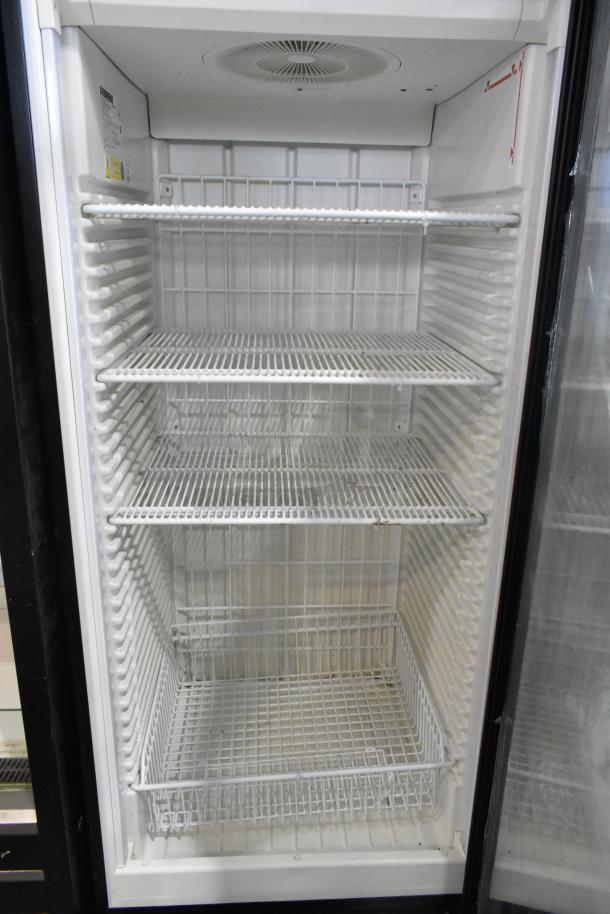 Liebherr commercial single door reach-in cooler with poly-coated racks, 115 volts, 1 phase, excellent condition.
