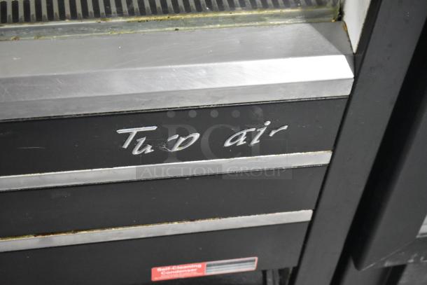 Turbo Air TOM-48E metal commercial open merchandiser. Visible brand logo, self-cleaning condenser label. 115V, 1 Phase.
