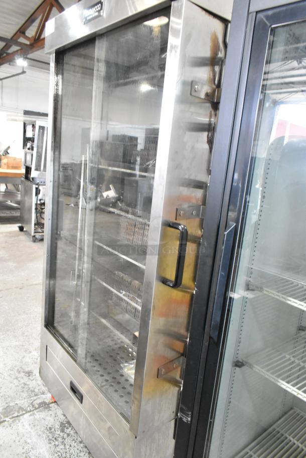 Southwood RG7 6 Spit Rotisserie Oven, stainless steel, natural gas, 114,000 BTU, on casters. Commercial-grade condition.