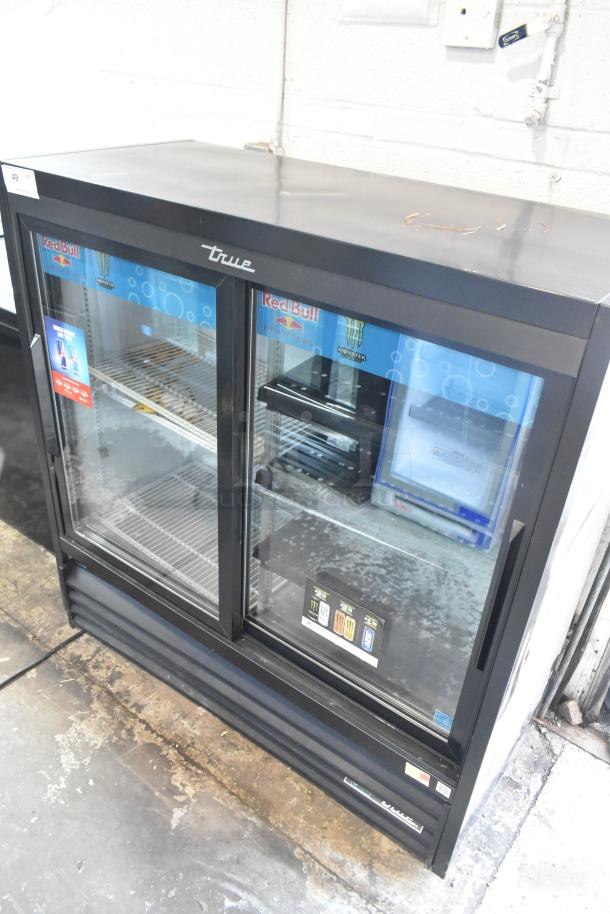 2019 True GDM-41SL-48-HC-LD 2-door cooler, black metal, sliding glass doors, poly-coated racks, lightly used, 115V.