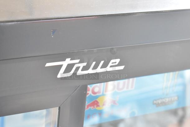 2019 True GDM-41SL-48-HC-LD cooler, black metal, two doors, brand logo visible, commercial merchandiser.