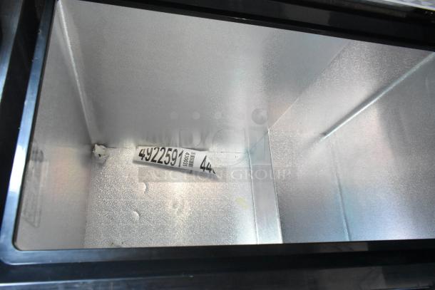 Frigidaire FGFRF7009-B-BLACK chest freezer with hinge lid; interior view, excellent condition, 115V, 1 phase.