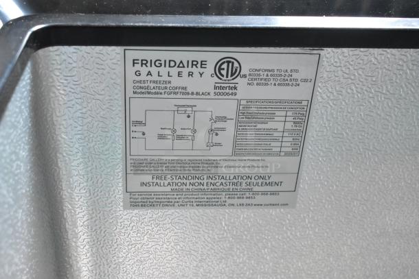 Frigidaire FGFRF7009-B-BLACK chest freezer label showing model, electrical specs, and installation details.