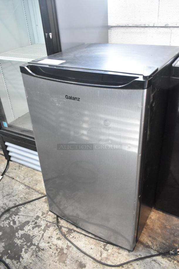 Galanz GL43S5 Mini Cooler, stainless steel finish, 115 Volts, good condition, model visible. Perfect for compact spaces.