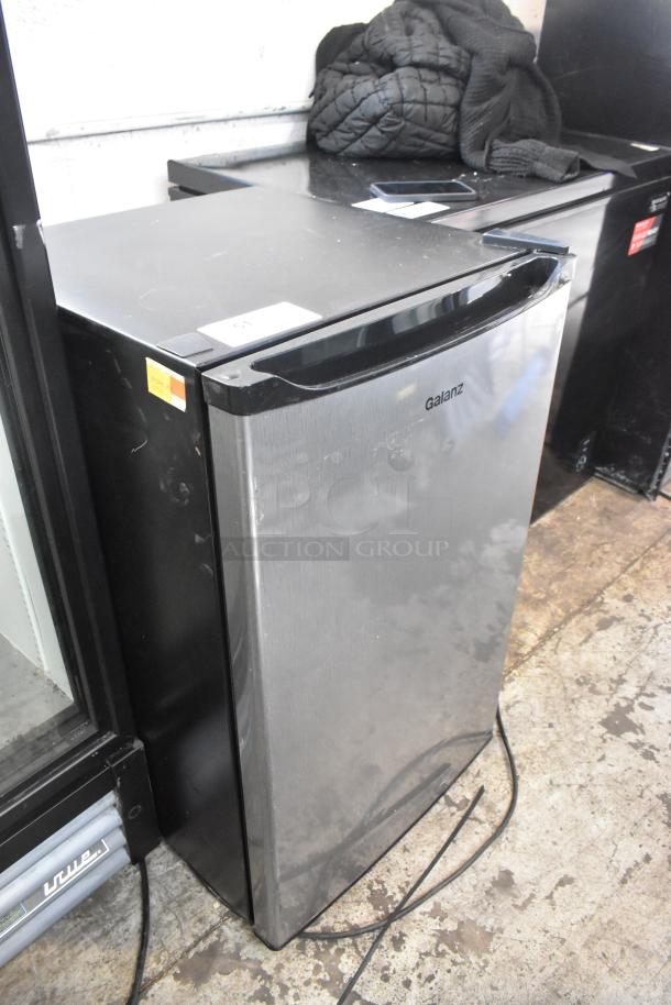 Galanz GL43S5 Mini Cooler, stainless steel finish, 115 Volts, 1 Phase, lightly used with minor scuffs, visible Galanz logo.