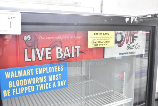 2021 True GDM-12-HC commercial cooler with single glass door, poly-coated racks, used condition. Labels include "Live Bait" signage.