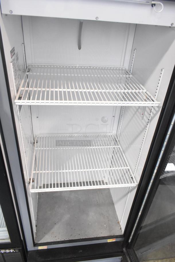 2021 True GDM-12-HC commercial cooler, single glass door, includes poly-coated racks, 115V, 1 phase, excellent condition.