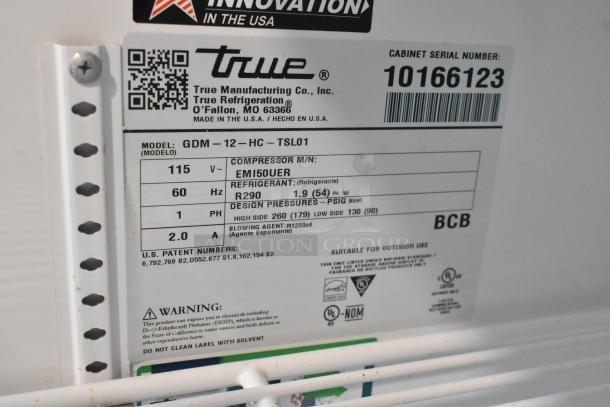 2021 True GDM-12-HC cooler label showing model, voltage, and specifications; 115V, 1 phase, R290 refrigerant.