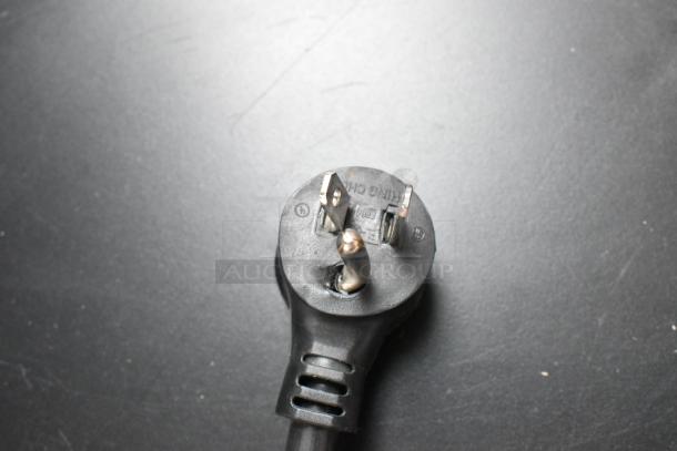 Close-up of the power plug for a 2021 True GDM-12-HC single door cooler, 115 volts, 1 phase.