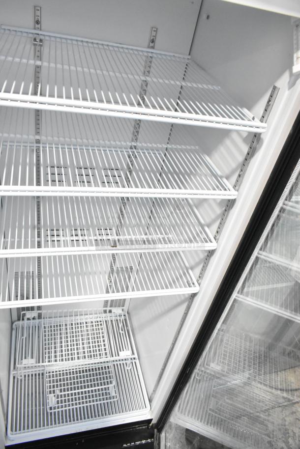 2019 Habcoe SE18 single door reach-in cooler with poly coated racks, excellent condition, 115 volts, 1 phase.