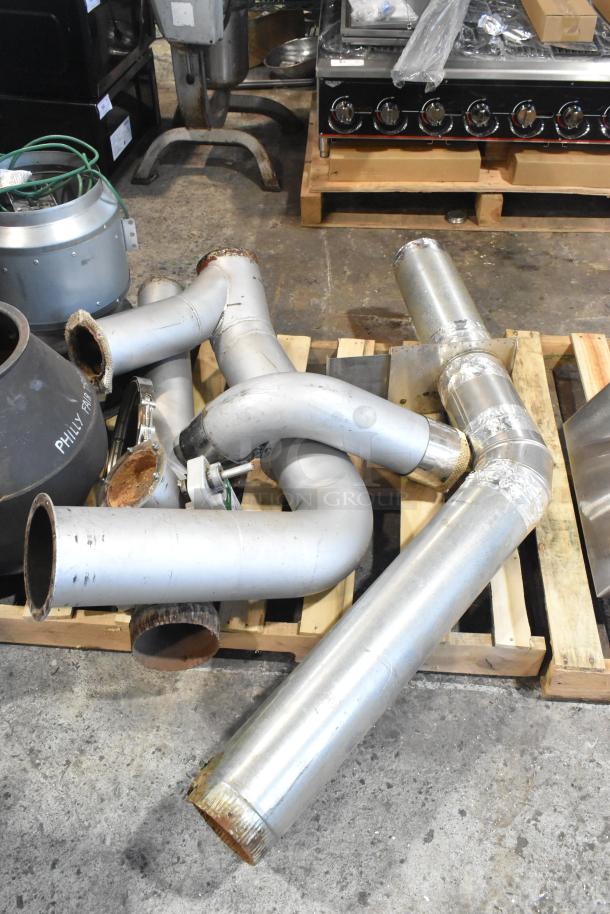 US Roaster Corp metal roaster/smoker parts, natural gas powered, 208-230/460V, 3 phase, on a pallet.