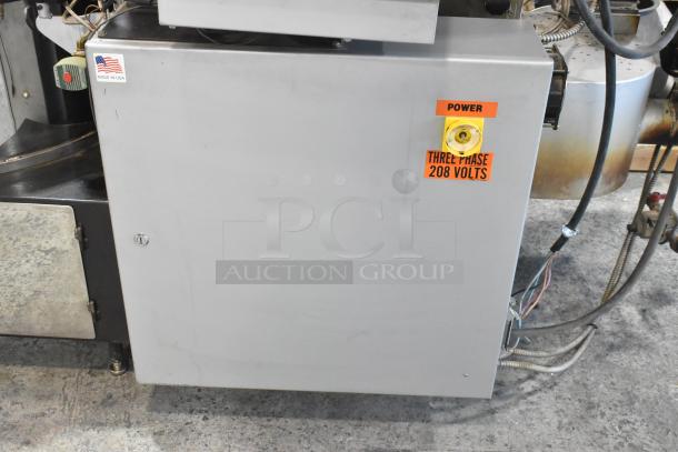 US Roaster Corp metal commercial gas roaster, 208-230/460V, 3-phase, "Made in USA" tag, power switch labeled 208 volts.