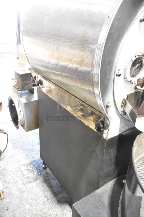 US Roaster Corp commercial metal roaster, natural gas powered, 208-230/460V, 3-phase. Stainless steel drum, excellent condition.