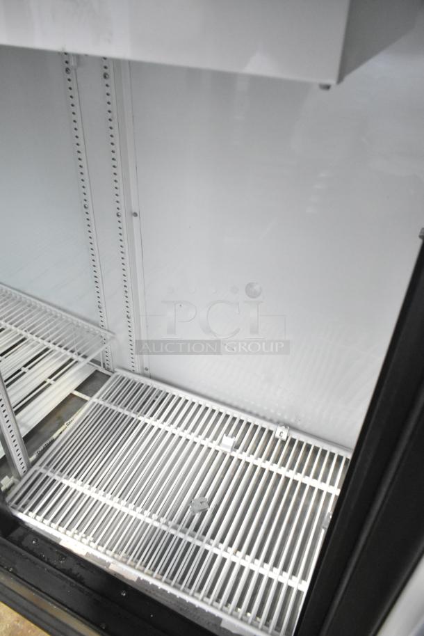 2019 True GDM-41SL-48-HC-LD commercial cooler interior, metal shelving with poly coating, 2-door reach-in design, 115V.