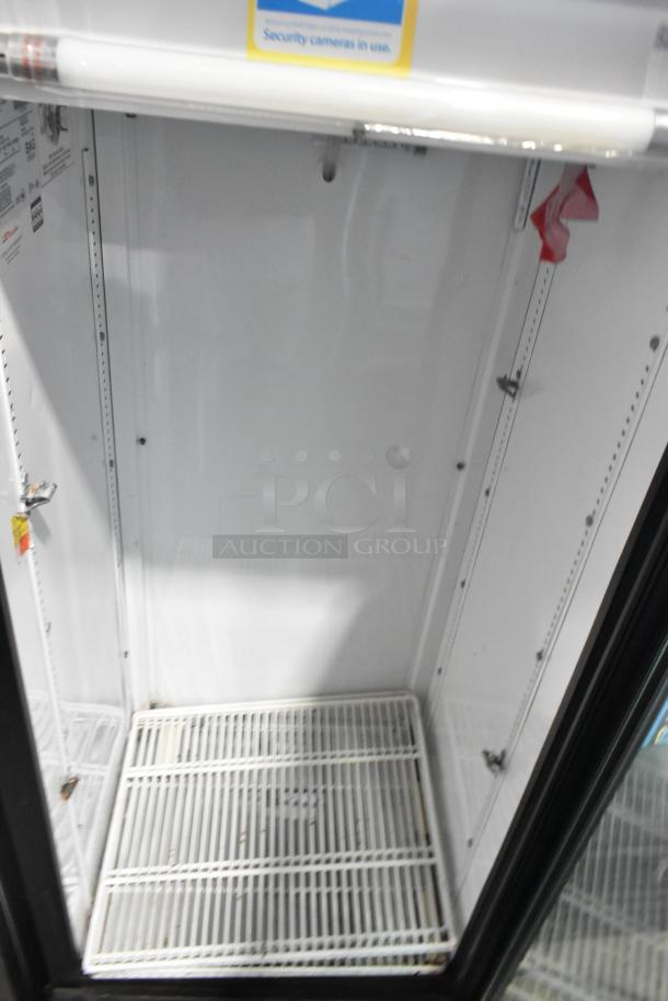 True GDM-12 commercial cooler, single door, metal frame, poly coated racks, 115V, 1 phase, clean condition, interior labels visible.