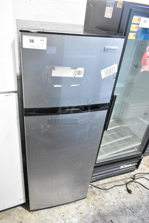 2024 Frigidaire EFR781-B-6COM reach-in cooler with freezer, 115 volts, 1 phase, visible wear, original labels intact.