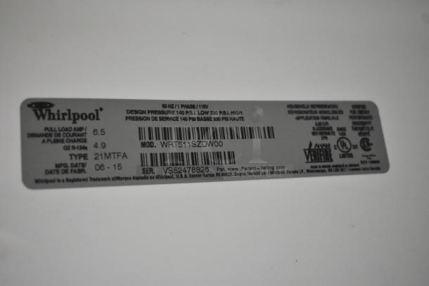 Whirlpool WRT511SZDW00 Reach In Cooler tag showing model, voltage, and serial number details.
