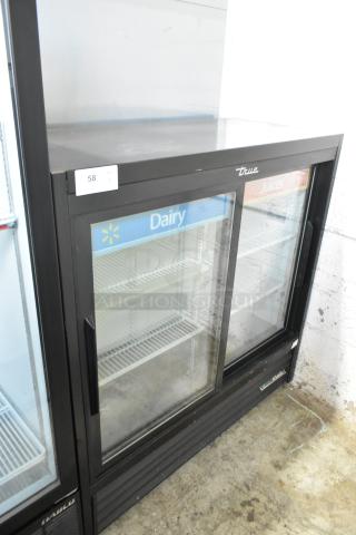 2019 True GDM-41SL-48-HC-LD metal commercial 2-door cooler with poly-coated racks, visible labels "Dairy" and "Juices".
