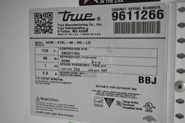 2019 True GDM-41SL-48-HC-LD cooler label; 115V, 1 phase, model and serial numbers, refrigerant type, certifications.