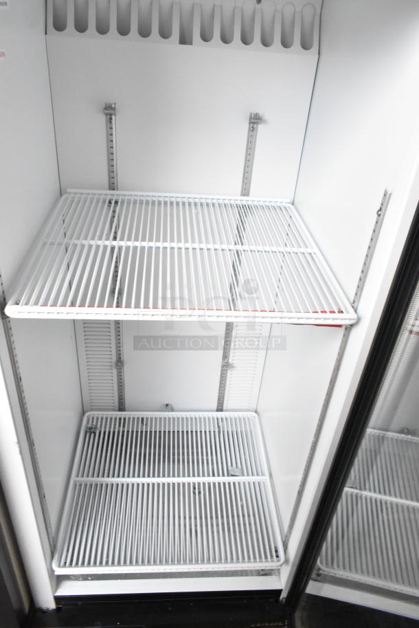 Habco SE12, single door reach-in cooler with poly-coated racks. Interior view, pristine condition. 115V, 1 phase.