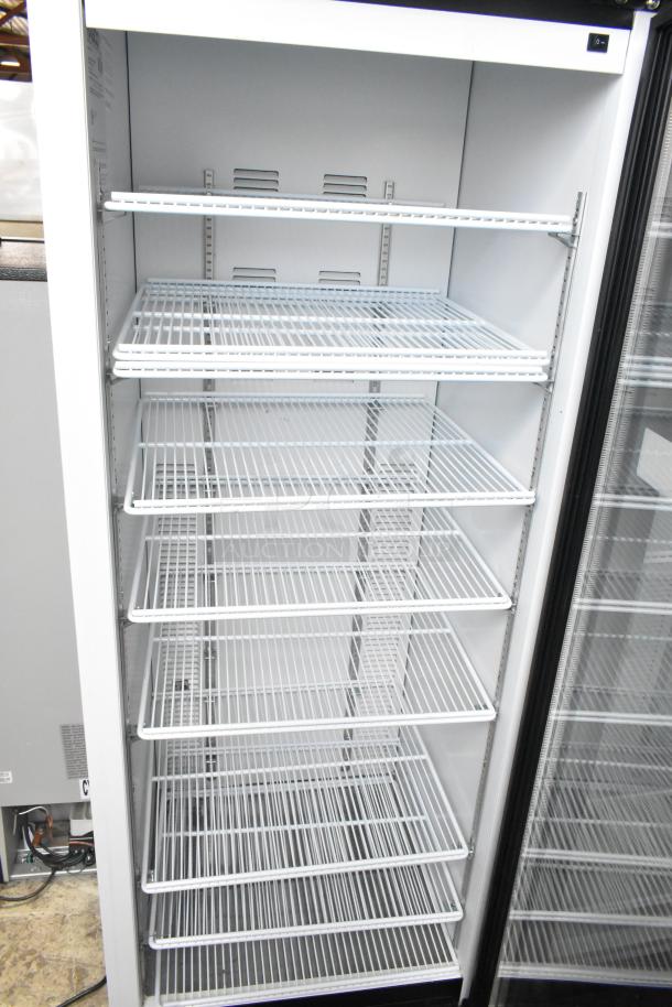 2019 Habco SE18 cooler with single glass door, metal body, poly-coated racks; 115V, 1 phase; excellent condition.