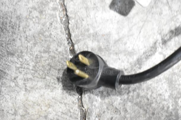 Close-up of a grounded electrical plug for the 2019 Habco SE18 Commercial Cooler. Features black casing and visible prongs.