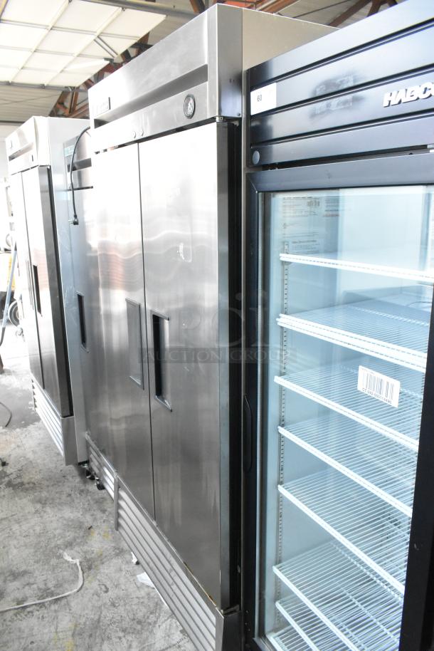 True T-35 stainless steel commercial 2-door cooler, poly-coated racks, on casters, 115 volts, 1 phase, excellent condition.