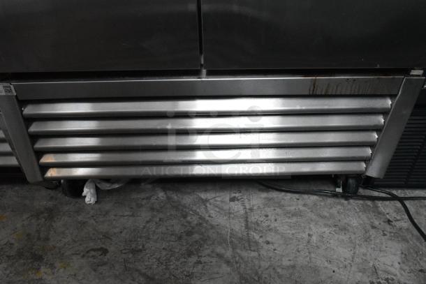 True T-35 stainless steel commercial 2-door reach-in cooler with poly coated racks and commercial casters; 115V, 1 phase.