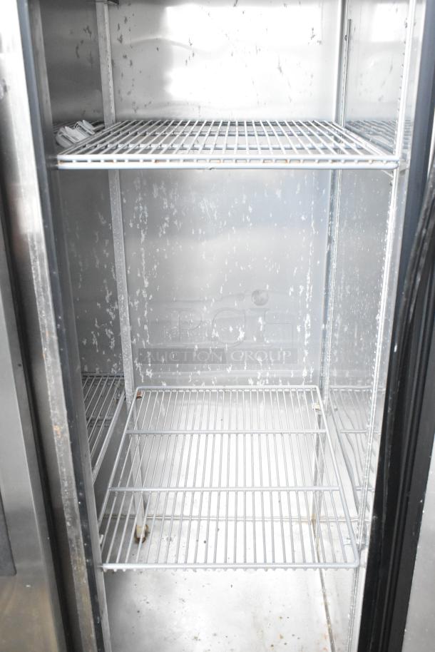 True T-35 stainless steel 2-door reach-in cooler with poly-coated racks, commercial casters, 115V, 1-phase.