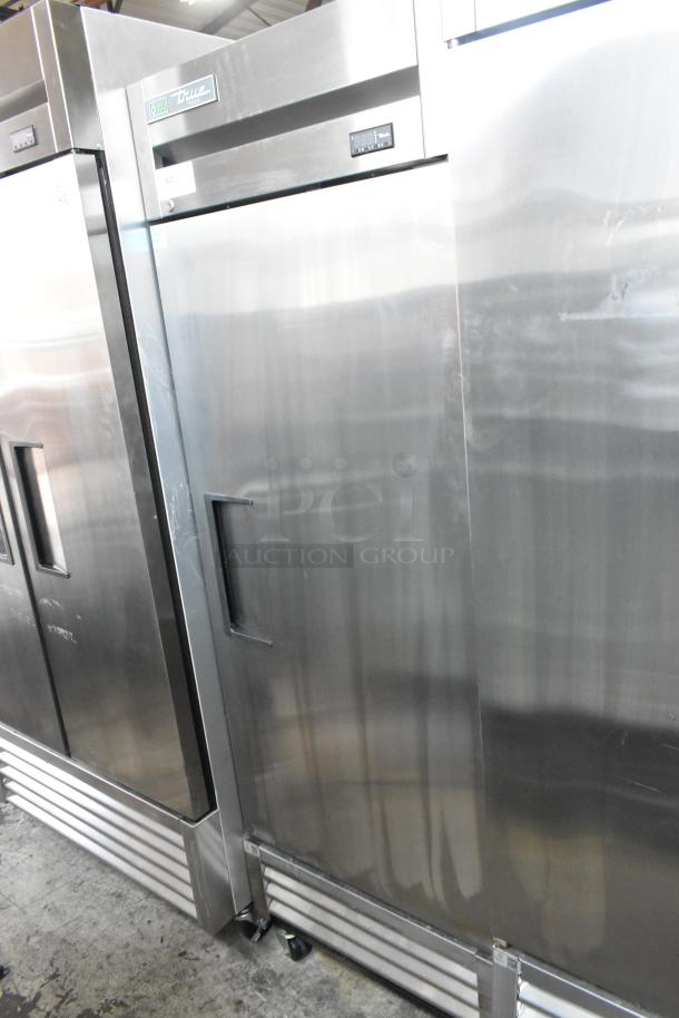 2019 True T-19F-HC stainless steel commercial freezer, single door, poly coated racks, on casters, 115V, visible brand label.