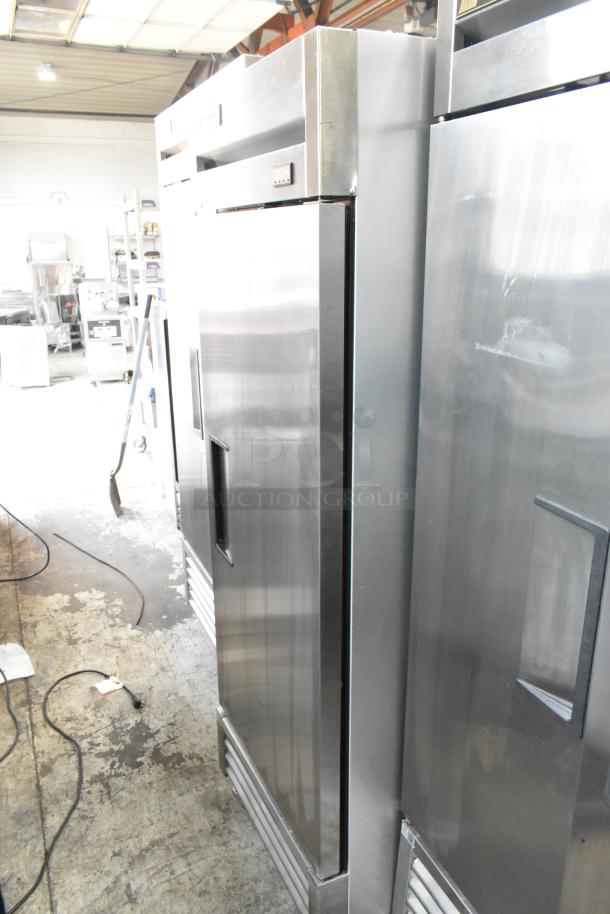 2019 True T-19F-HC stainless steel commercial single door freezer, poly coated racks, on casters, excellent condition.