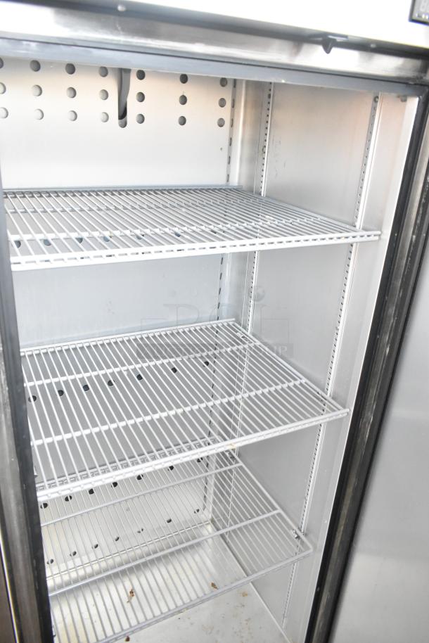 2019 True T-19F-HC stainless steel commercial freezer with poly-coated racks, single door, on casters, 115V, 1 phase.