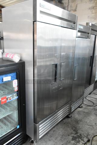 2022 True T-35-HC stainless steel commercial 2-door cooler with poly coated racks, on casters. 115V, 1 phase, excellent condition.